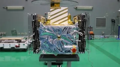 Satellite wrapped in thermal insulation during cleanroom integration
